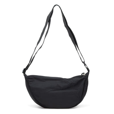 Selene Moon Bag - A black shoulder bag with a curved shape and two adjustable straps, featuring a logo on the front.