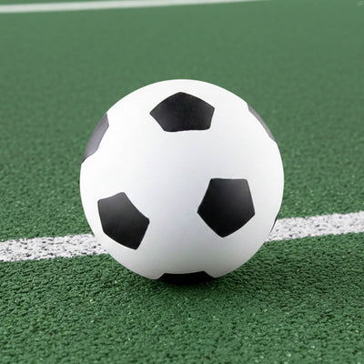 High Bounce Soccer Ball - A high bounce soccer ball featuring a classic black and white design, resting on a green surface.