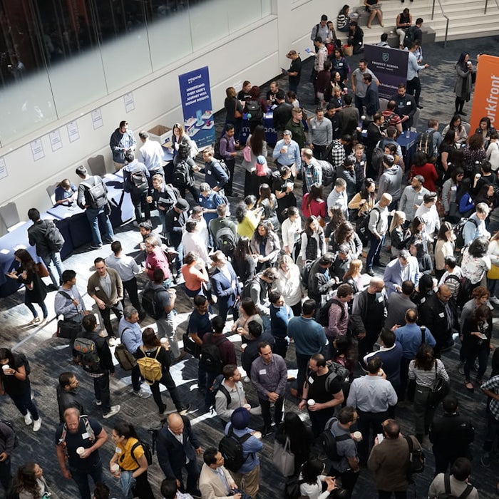 crowd of people in building lobby