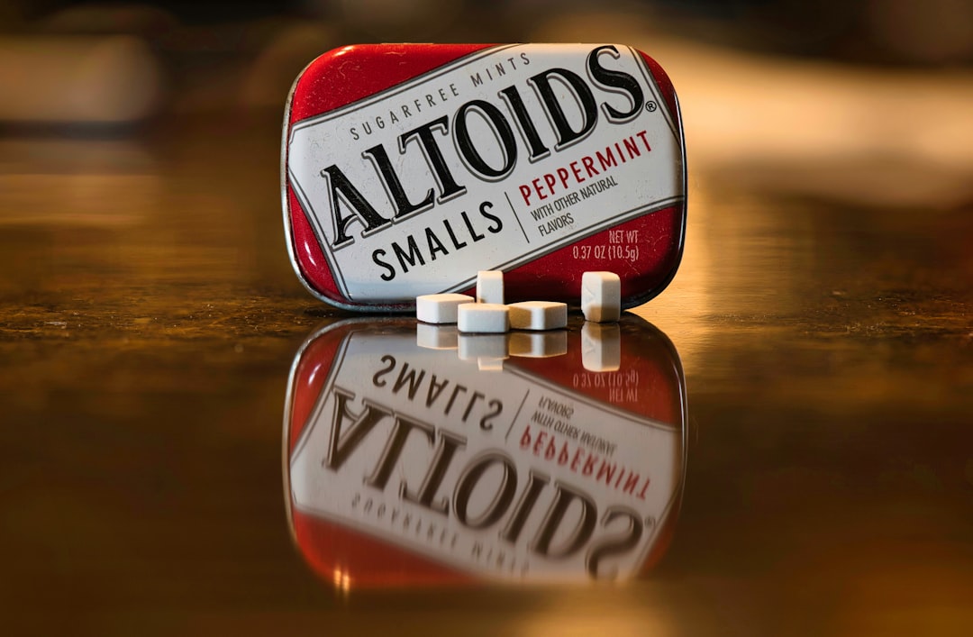 a couple of red and white circular objects with black text on them
