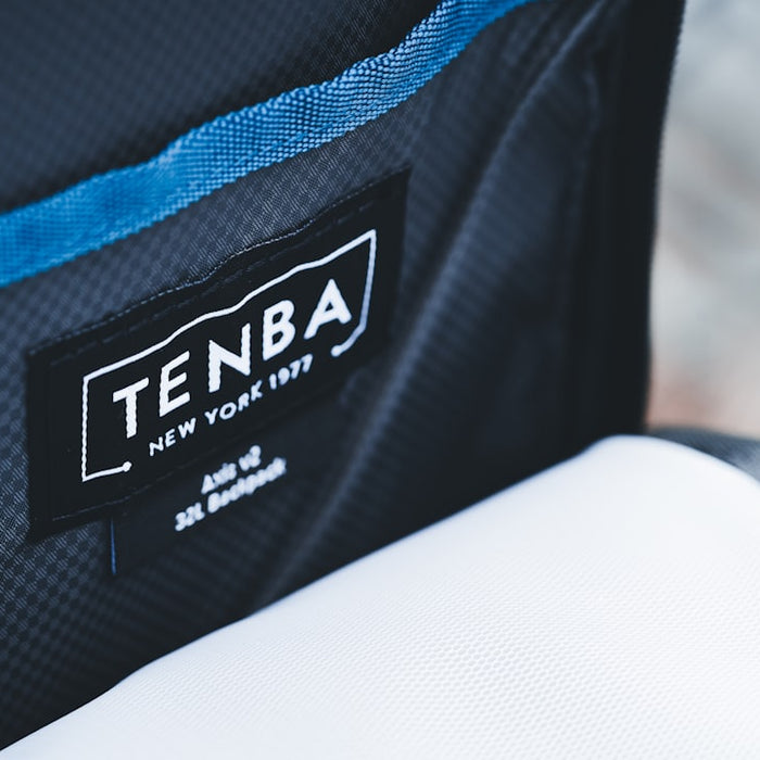 a close up of a black and blue bag