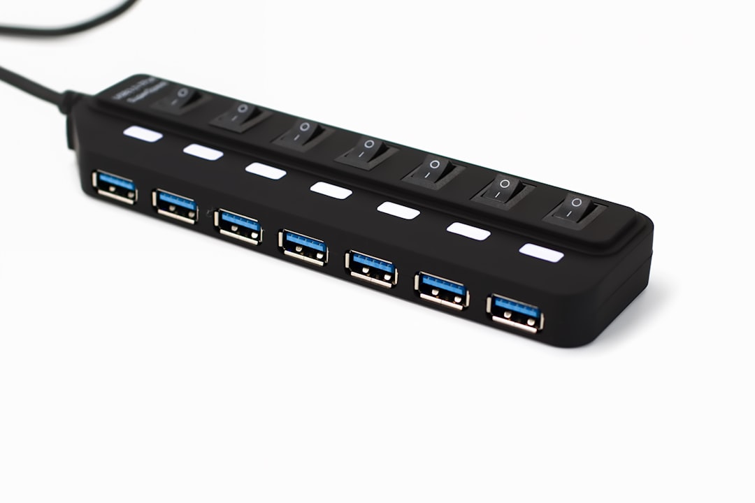 Black usb hub with seven ports and switches