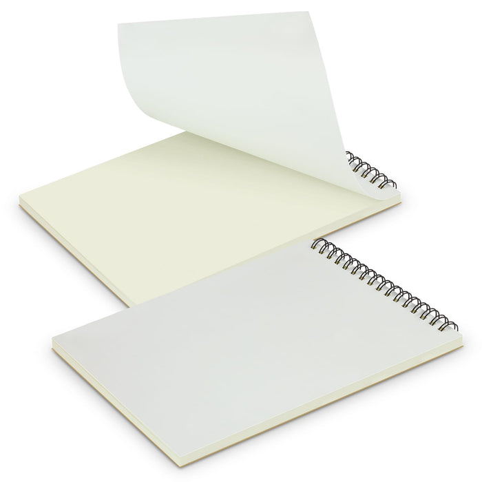 Scribe Full Colour Note Pad - Medium - A medium-sized note pad with a spiral binding, featuring blank white and pale yellow pages. It has a logo on the cover.