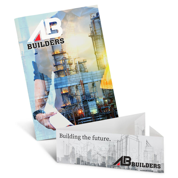 Camri Full Colour Notebook - Medium - A medium notebook with a vibrant design featuring industrial imagery and a logo. The notebook is opened to display its inside pages.
