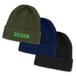 Denali Beanie - Three knitted beanies in olive green, navy blue, and black, each featuring a logo on the front.