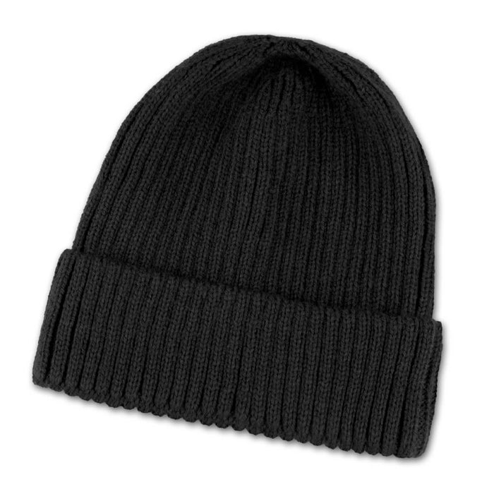 Denali Beanie - A black knitted beanie with a rolled cuff and a textured finish. It features a logo on the side.