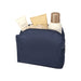 Muse GRS RPET Toiletry Bag - A navy toiletry bag containing various skincare products, including tubes and a bottle, with a textured item inside.