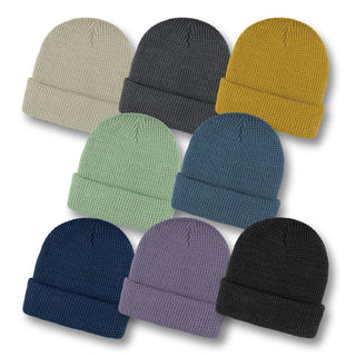 Galway Waffle Beanie - A set of Galway Waffle Beanies in various colours: beige, grey, mustard, green, navy, purple, and black.