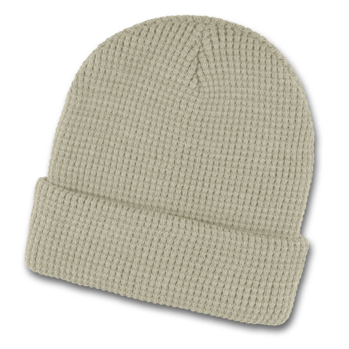 Galway Waffle Beanie - A Galway Waffle Beanie in a soft, light green colour with a textured knit pattern and a folded brim.