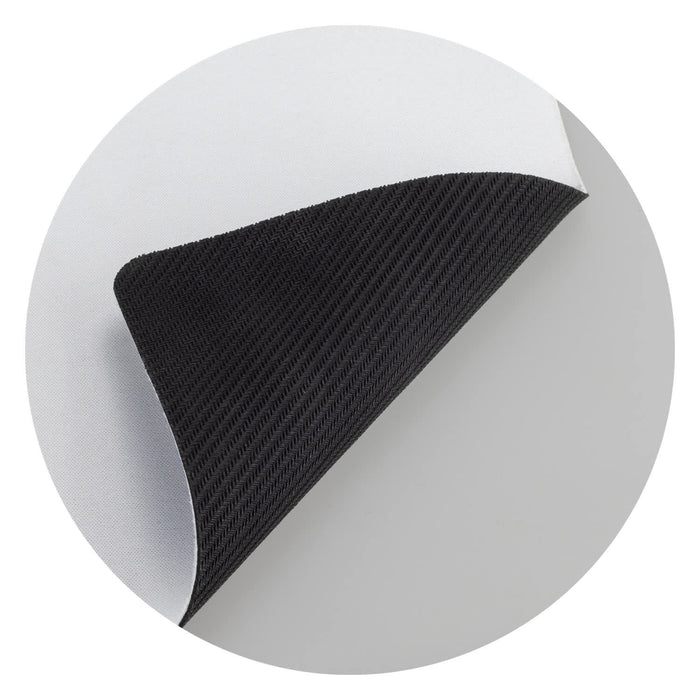 Desk Mat - A desk mat featuring a grey top surface and a textured black underside, designed for office use.