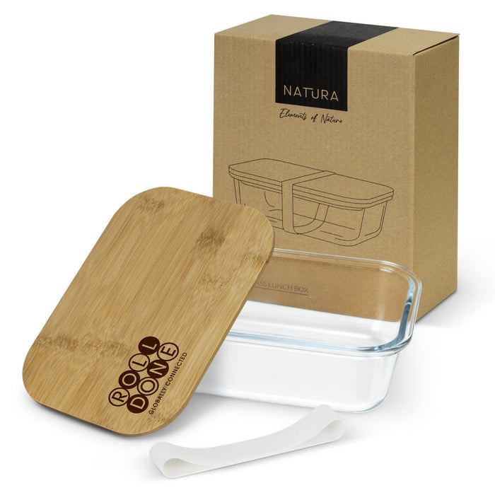 NATURA Iris Glass Lunch Box - A glass lunch box with a bamboo lid and a silicone band, displayed with its packaging in a natural brown box.