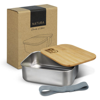 NATURA Stainless Steel Lunch Box - A stainless steel lunch box with a wooden lid, grey strap, and packaging in natural tones.