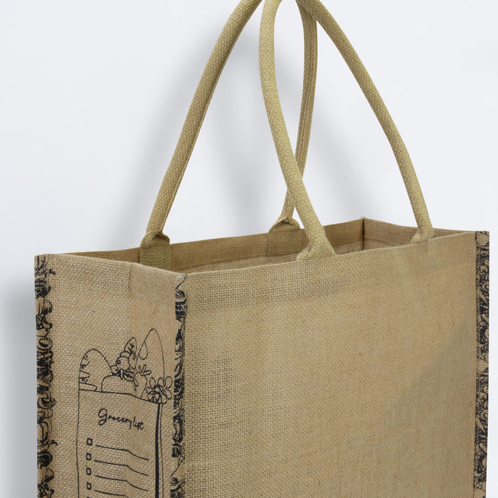 Modena Jute Tote Bag - A jute tote bag in natural brown, featuring decorative elements and sturdy handles. Brand logo is present.