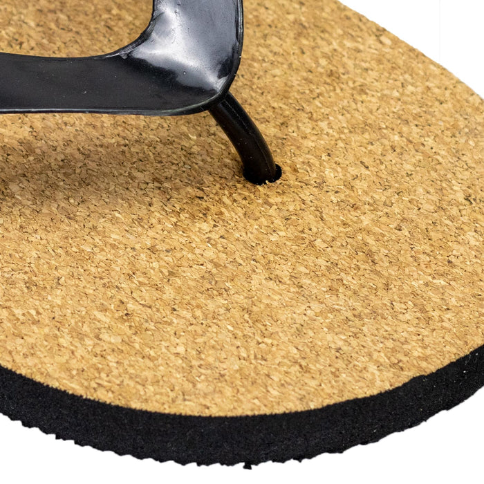 Fiji Flip Flops - A black thong sandal with a cork footbed and a rubber sole, featuring a logo on the strap.