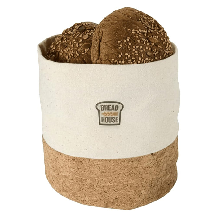 Toma Bread Basket - A linen bread basket in white and brown holding sesame seed rolls, featuring a small logo.