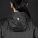 Swiss Peak Urban Windbreaker - A black windbreaker jacket featuring a hood and a logo on the back.