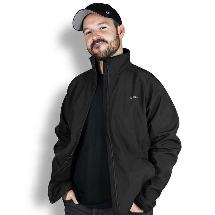 Swiss Peak Urban Softshell Jacket - A man wearing a black Swiss Peak Urban Softshell Jacket with a branded logo, set against a plain background.