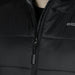 Swiss Peak Urban Puffer Vest - A black puffer vest featuring a zip closure and a logo on the upper right side.