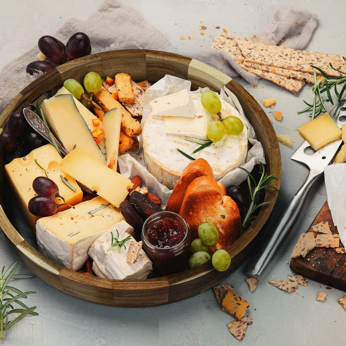 Keepsake Platter Tray - A wooden platter tray filled with various cheeses, grapes, crackers, and a jar of jam, styled with herbs.