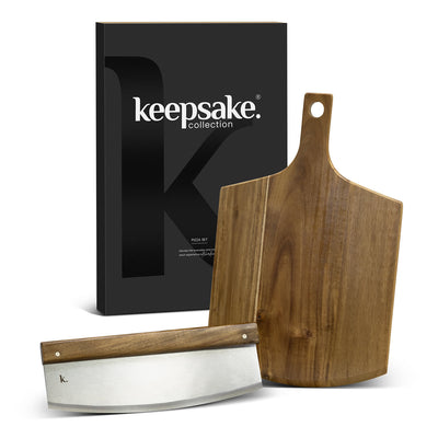 Keepsake Pizza Set - A wooden cheese board and knife set, featuring a stainless steel blade, packaged in a sleek black box with a logo.