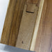 Keepsake Recipe Book Holder - A wooden recipe book holder featuring a smooth finish and a branding logo, showcasing rich brown tones.