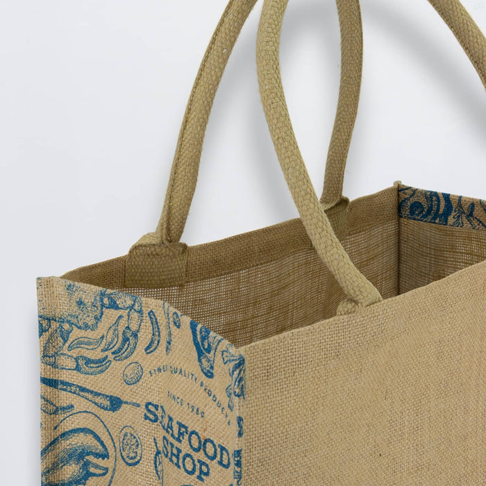 Lanza Jute Tote Bag - A jute tote bag featuring a natural beige colour with a blue design and sturdy handles. It has branding on the side.