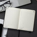 A5 Daily Diary - 2027 - A5 daily diary for 2027, featuring blank pages for each day, with a black cover and a ribbon bookmark.