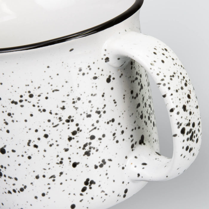 Bendigo Ceramic Mug - A ceramic mug with a speckled white design and a black rim, featuring a sturdy handle.