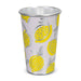 Burano Colour Changing Cup - A drink cup featuring a lemon design in yellow and silver on a light purple background. It has a metallic interior and a logo.