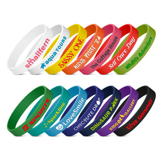 Kids Silicone Wrist Band - Embossed - A collection of silicone wristbands in various colours, featuring embossed text and different designs.