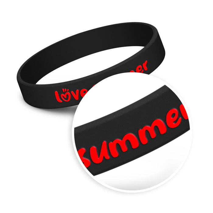 Kids Silicone Wrist Band - Embossed - A black silicone wristband with red embossed text. The band features a simple, smooth design.