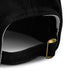 Essence Organic Cap - A black cap featuring a metal fastening at the back, showcasing its stitching and material detail.