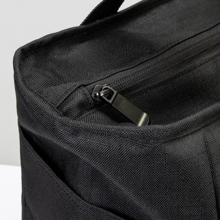 Oceana Recycled Cooler Bag - A black cooler bag with a zip closure and textured fabric, featuring an exterior pocket.