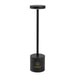 Nouveau Rechargeable Table Lamp - A black rechargeable table lamp with a cylindrical base and a circular top, featuring a logo on the base.