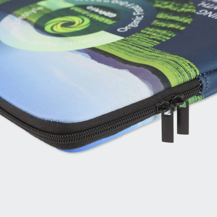 Full Colour Laptop Sleeve - Small - A small, full colour laptop sleeve with a blue and green design and a black zipper. Features a logo.