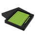 Omega Notebook and Pen Gift Set - A green notebook and pen gift set displayed in a black box, featuring a sleek design.