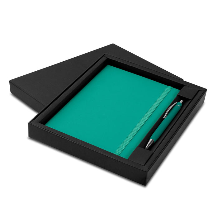 Omega Notebook and Pen Gift Set - A teal notebook and matching pen in a black gift box, featuring a logo on the pen.