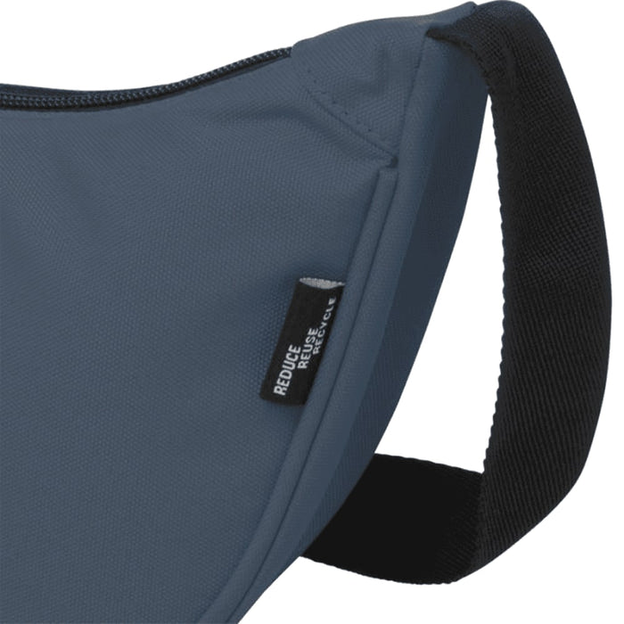 Byron Recycled Waist Bag 1.5L - A blue waist bag with a black strap, featuring a small logo tag.