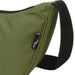 Byron Recycled Waist Bag 1.5L - A green waist bag with a black strap and a branding label. The bag features a smooth finish and a zip closure.
