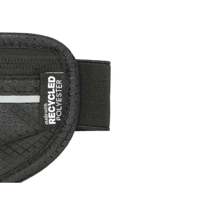 Varyon GRS Recycled Running Waist Pack - A black running waist pack featuring a textured fabric and a label indicating it is made with recycled polyester.