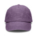 Vintage Washed Cap - A vintage washed cap in a muted purple colour, featuring a structured brim and a logo on the front.
