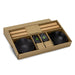 Keepsake Sushi Set - A sushi set featuring black bowls, bamboo chopsticks, and accompanying sauce dishes, presented in a cardboard box.