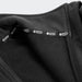 Swiss Peak Urban Unisex Softshell Jacket - A black softshell jacket with a fleece interior and a logoed neckline.