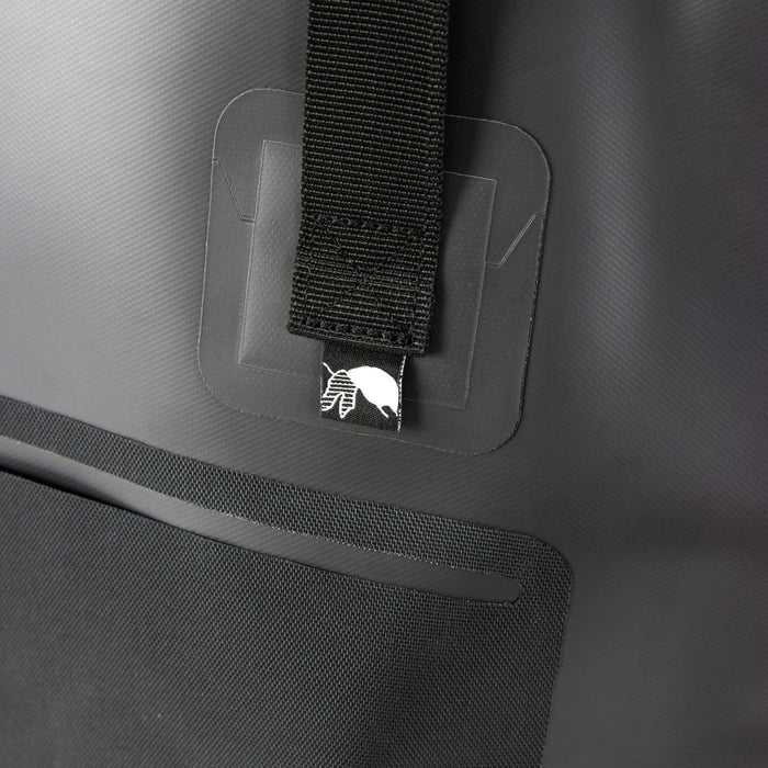Frontier Bucket Bag - A black bucket bag with a strap and a branded logo on the front. Features a smooth, matte texture.