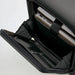 Kadi Carry-On Suitcase - Business - A black carry-on suitcase interior featuring compartments for a laptop and documents. It includes a logo.