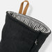 Keepsake Canvas Apron & Oven Mit Set - A black oven mitt with a striped interior and a hanging loop, featuring a small logo.