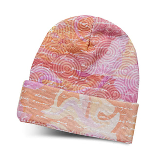 Everest Custom Full Colour Beanie - A full-colour beanie in pink and orange hues with a swirled pattern and a cuffed design. It has a logo.