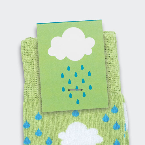 Pixel Knitted Business Socks - Green knitted business socks with a cloud and raindrop pattern, featuring a tag with a logo.