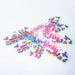 Prism Print - 250 x 50mm Sticker - A collection of colourful stickers featuring floral and butterfly designs, displayed against a white background.