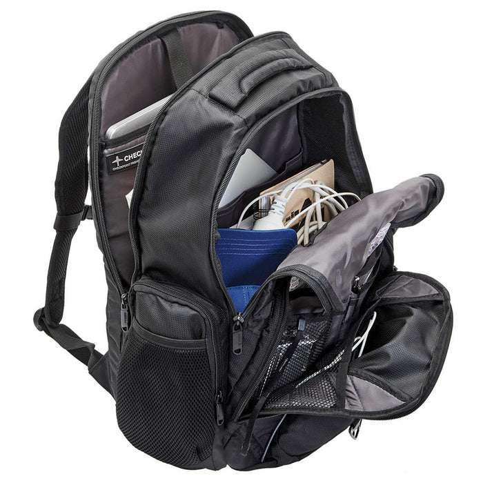 Fortress Laptop Backpack - A black laptop backpack with multiple compartments, showcasing a laptop, cables, and other accessories inside.
